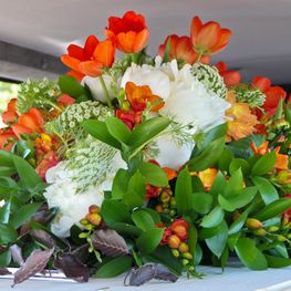 Funeral flowers on casket